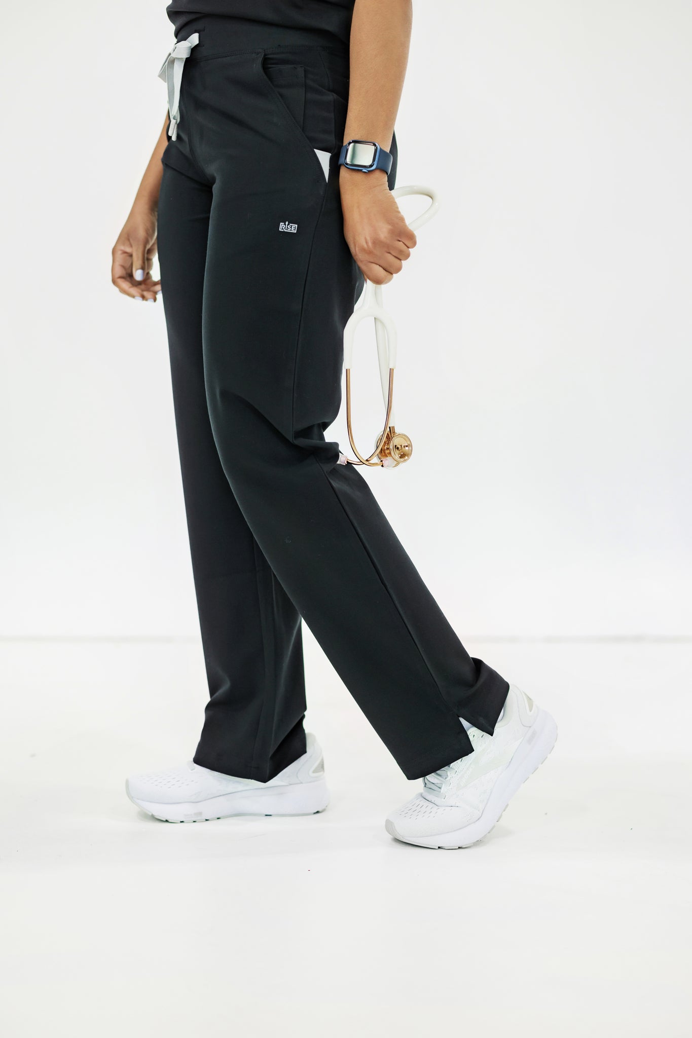 Classic black scrub pant designed to move with you, providing comfort and flexibility.