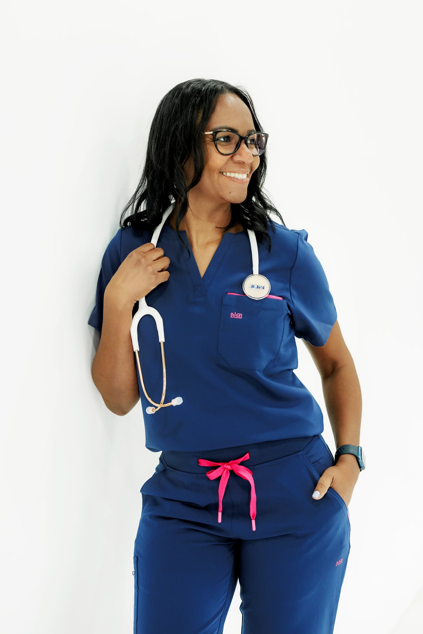 Stylish and durable navy scrub top with a classic crew neck design.