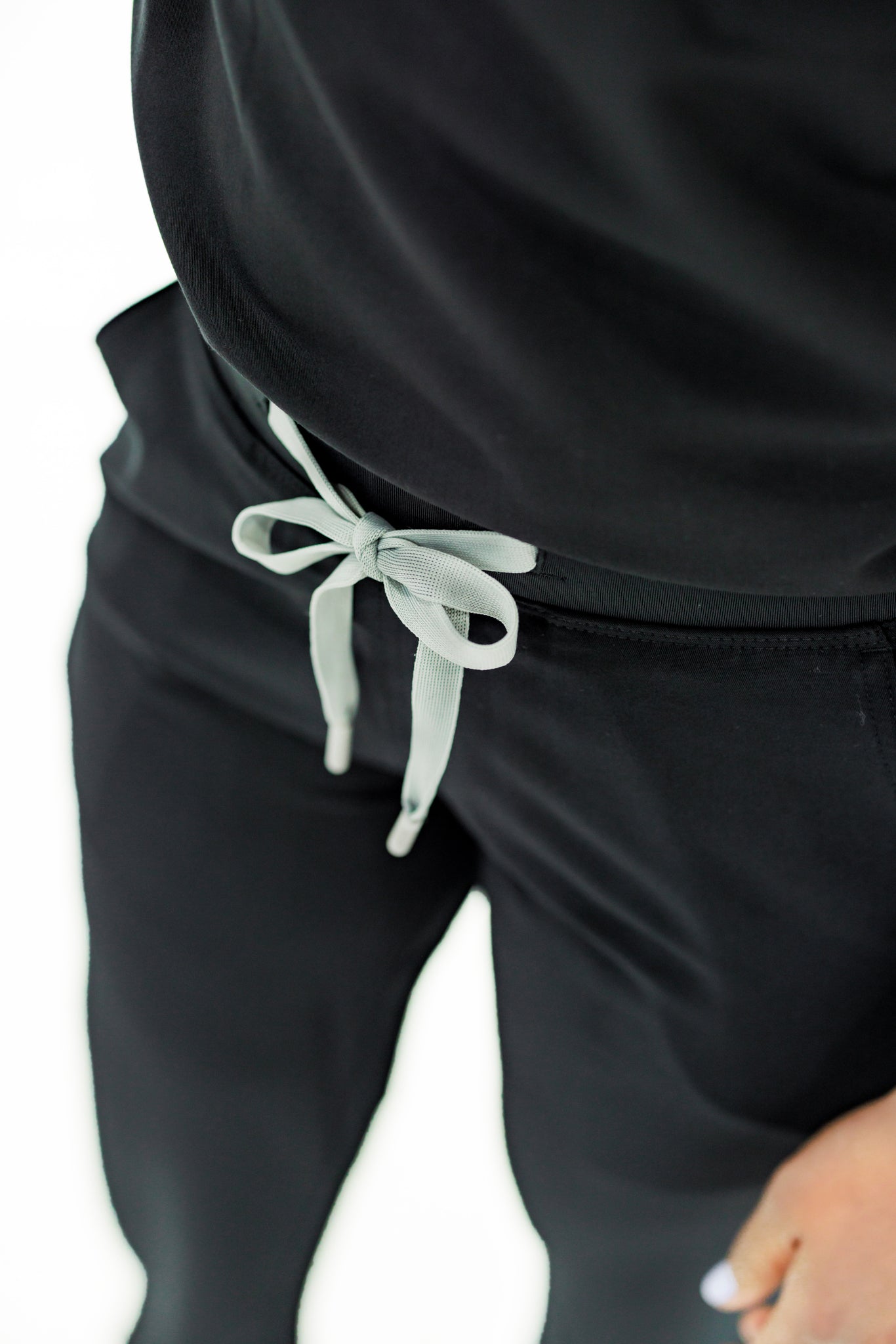 Designed for comfort and flexibility, these black scrub pants are perfect for medical workers.