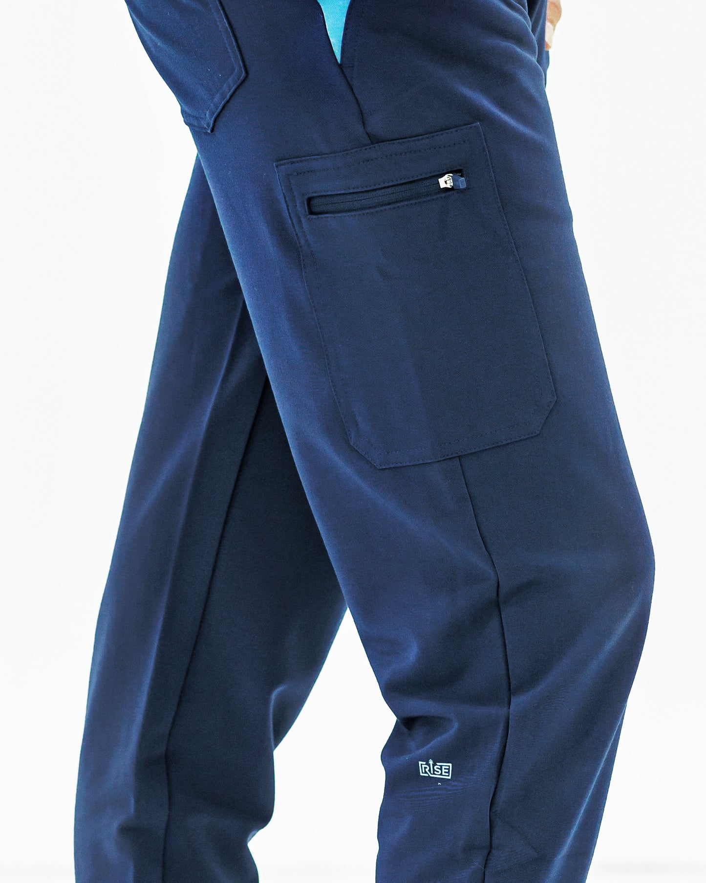 Flexible and durable navy jogger scrub pant providing comfort and a trendy fit.