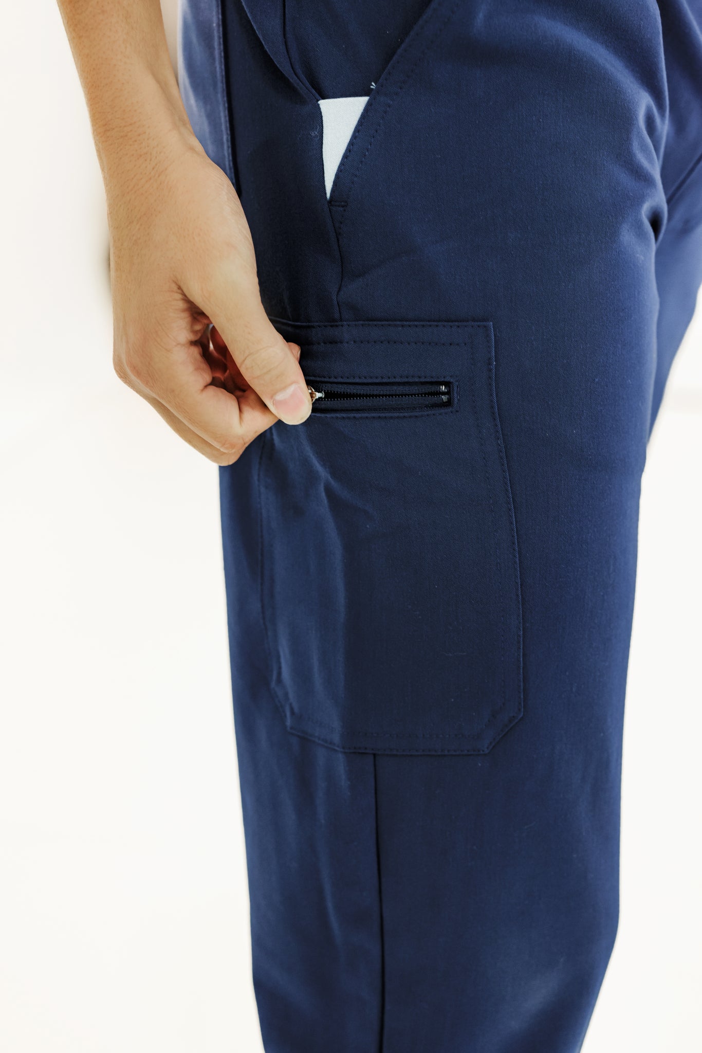 Modern navy jogger scrub pant offering flexibility and durability for busy healthcare workers.