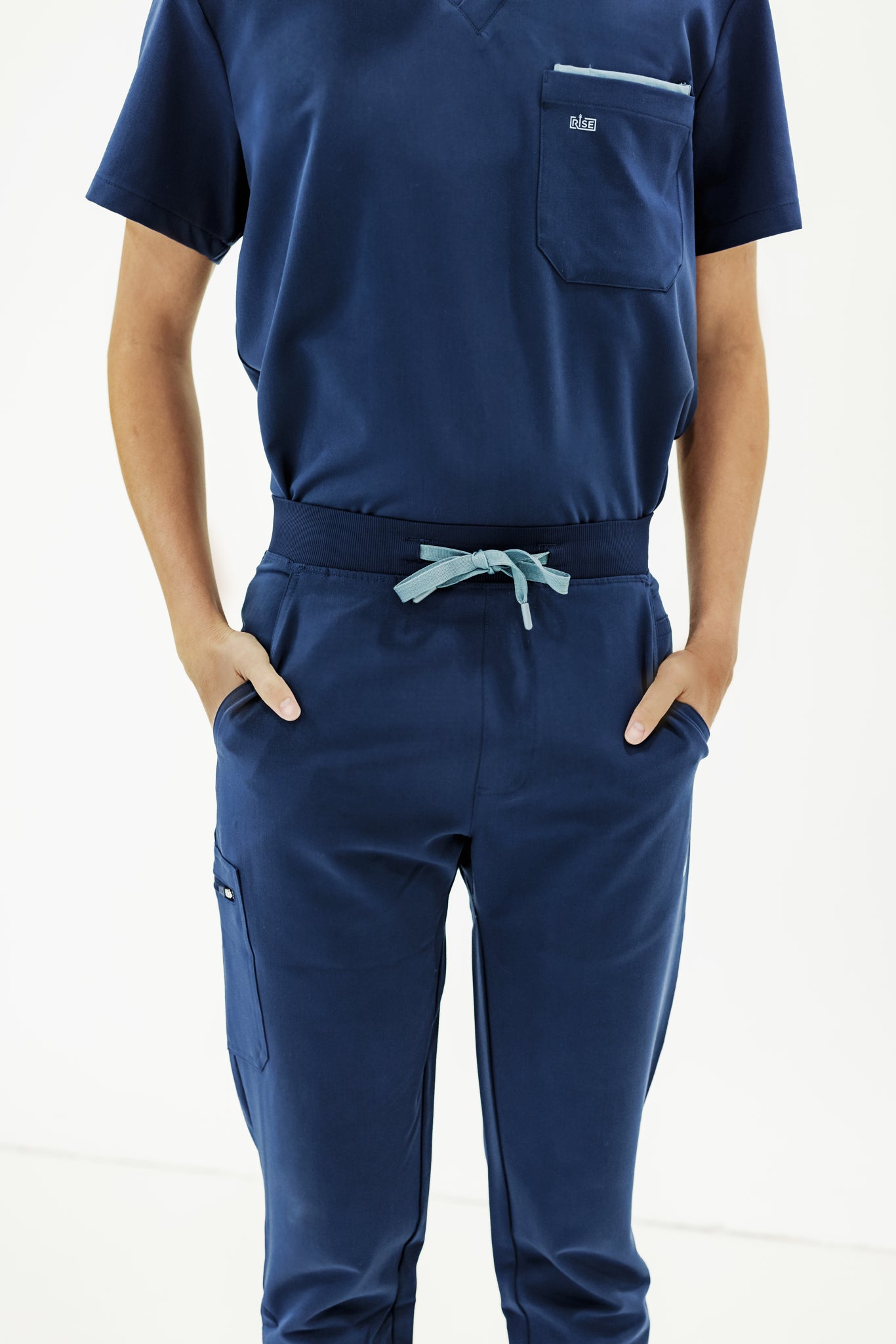 Navy jogger scrub pant designed for active healthcare workers, combining style and comfort.