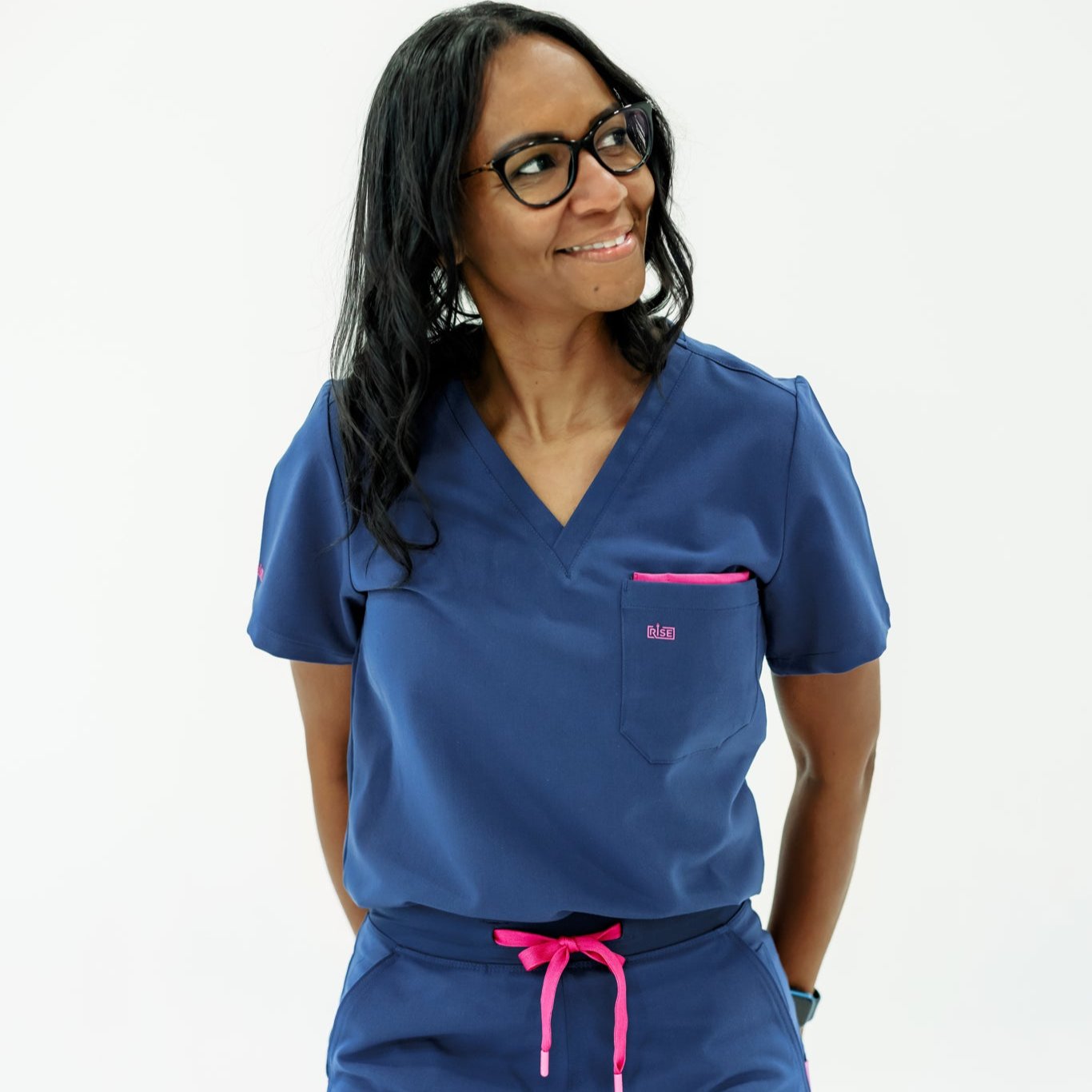 Comfortable navy V-neck scrub top offering all-day wear for medical professionals.