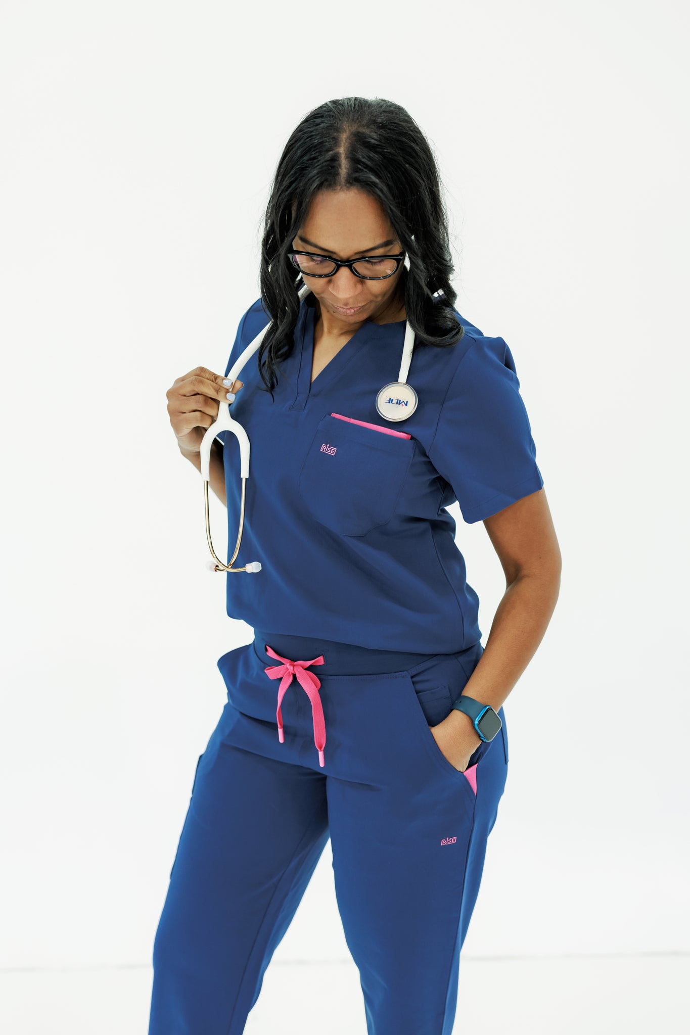 Classic navy V-neck scrub top offering comfort, style, and durability.