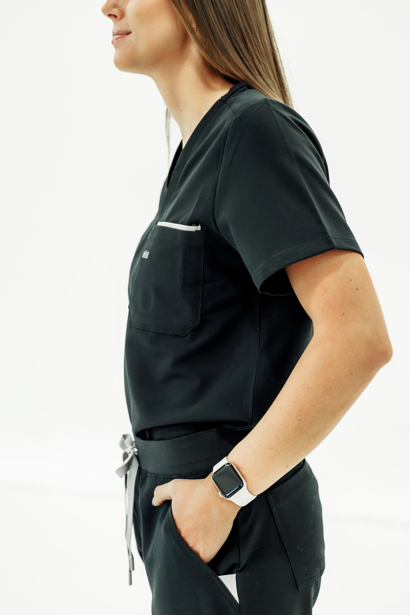 Comfortable and breathable black V-neck scrub top for medical workers on the go.
