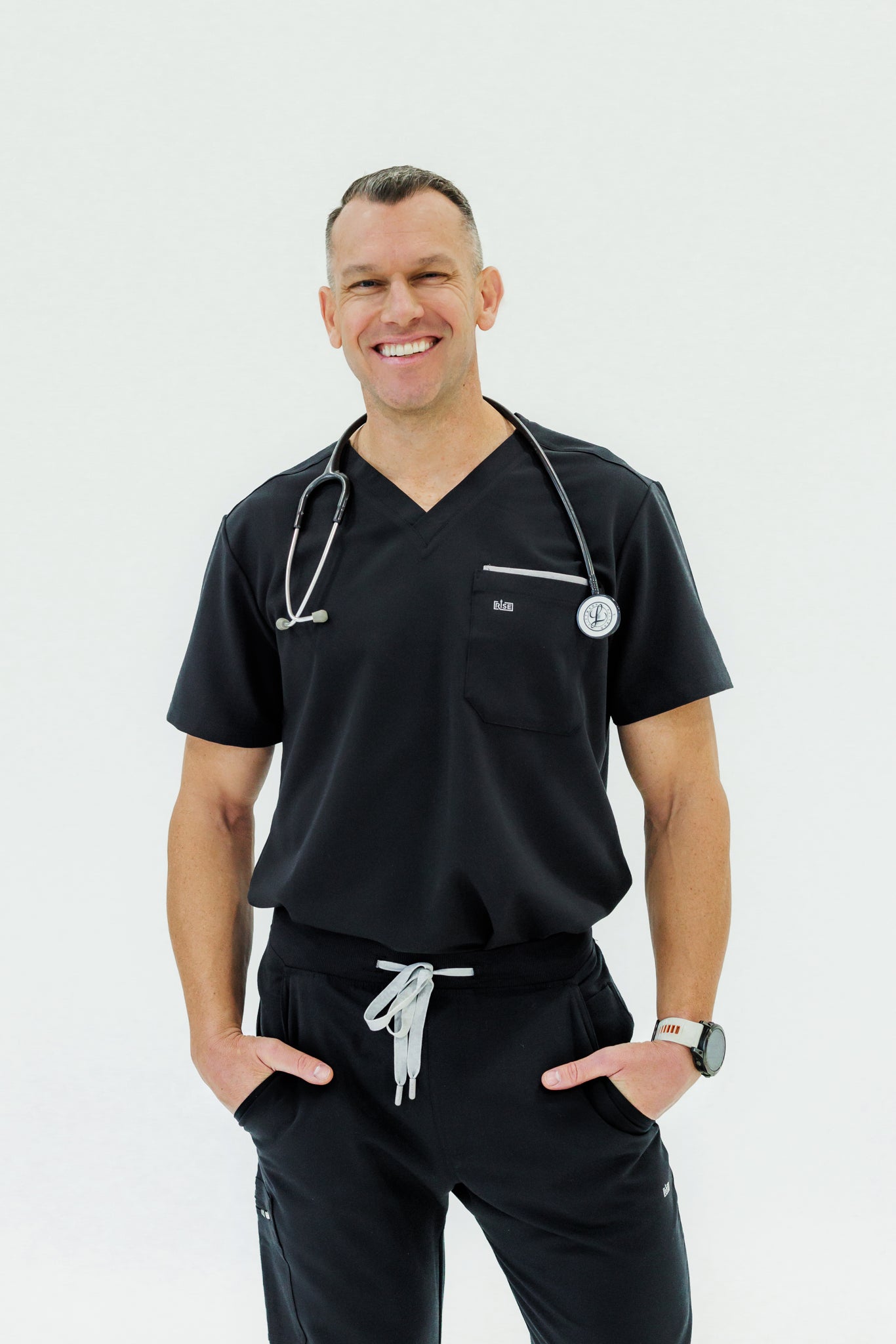 Classic black V-neck scrub top offering a professional look and comfort for healthcare workers.