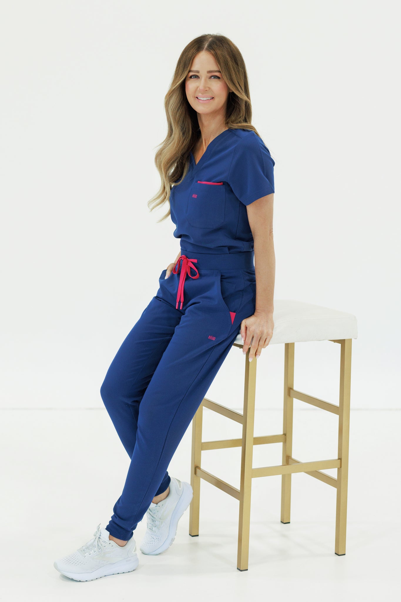 Navy jogger scrub pant designed for comfort and movement during long shifts.
