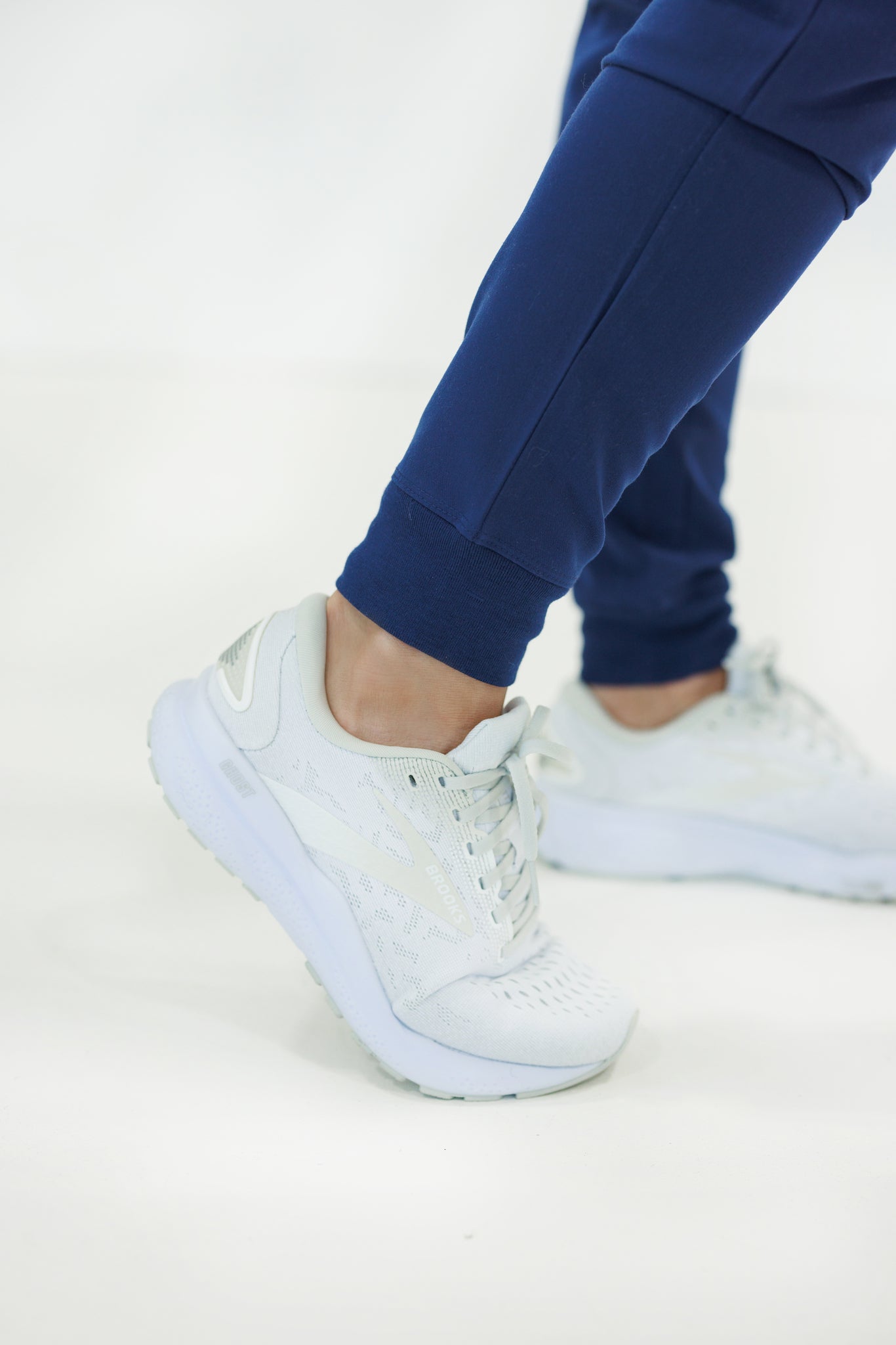 A stylish, comfortable jogger scrub pant in navy, ideal for healthcare professionals.