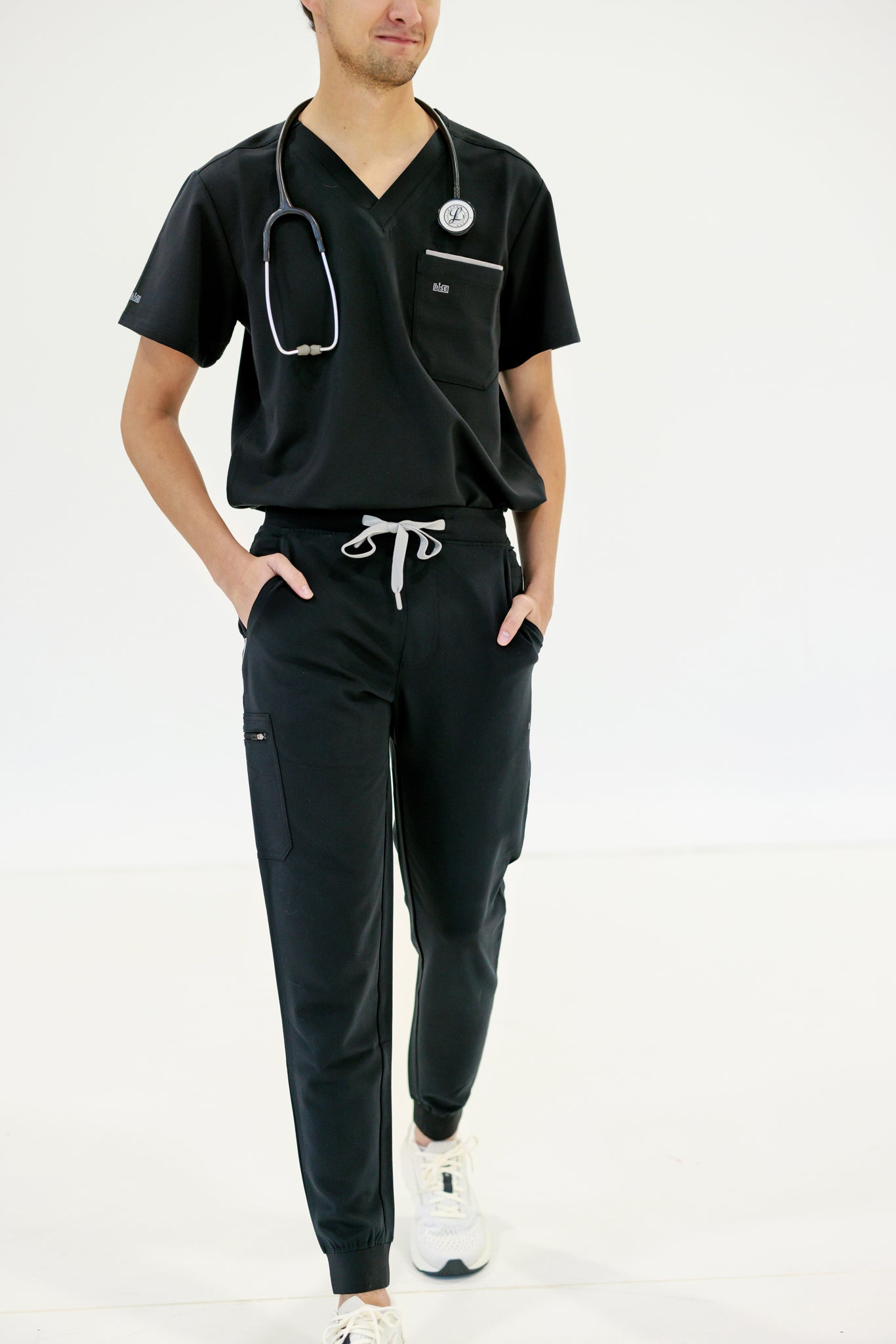 Black jogger scrub pant designed for active professionals, offering a sleek, modern fit.