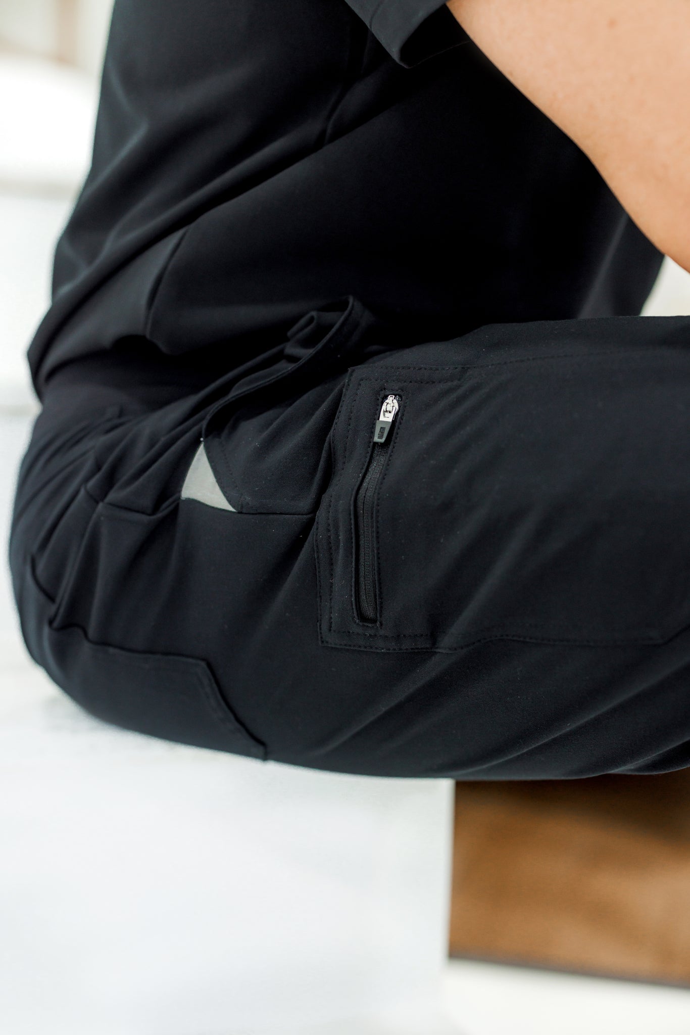 Black classic-fit scrub pant offering a polished look and maximum comfort for long shifts.