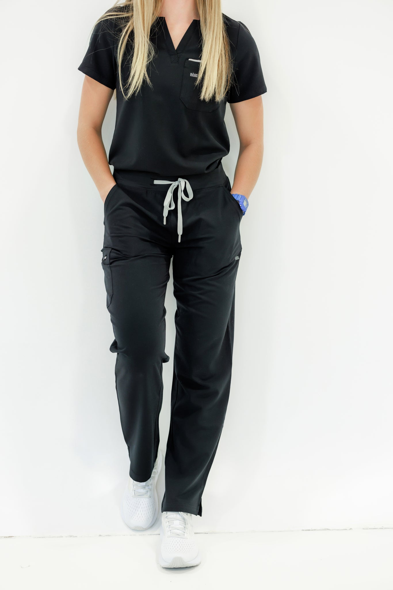 Professional black scrub pant offering all-day comfort with a durable, classic fit.