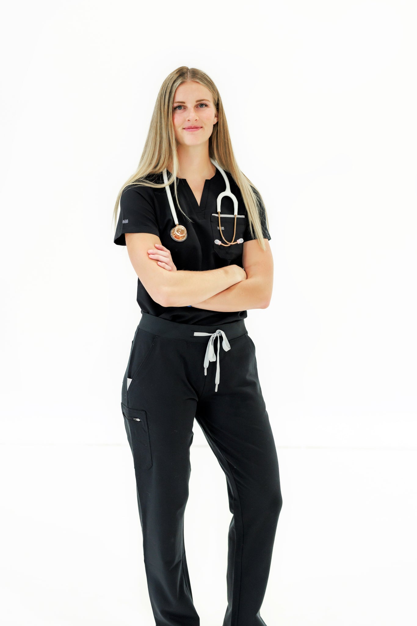 A sleek, flattering black scrub pant offering comfort and style for healthcare professionals.