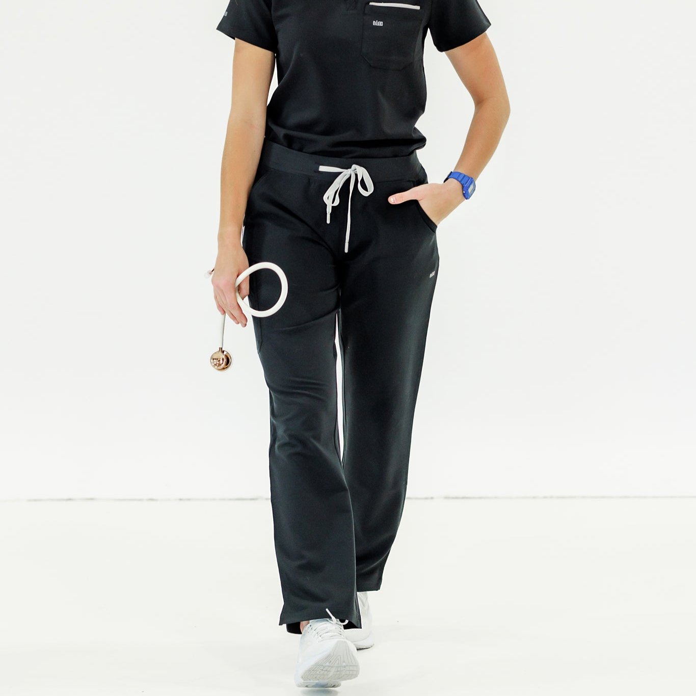 Black scrub pant with a professional fit, offering comfort and durability for long shifts.