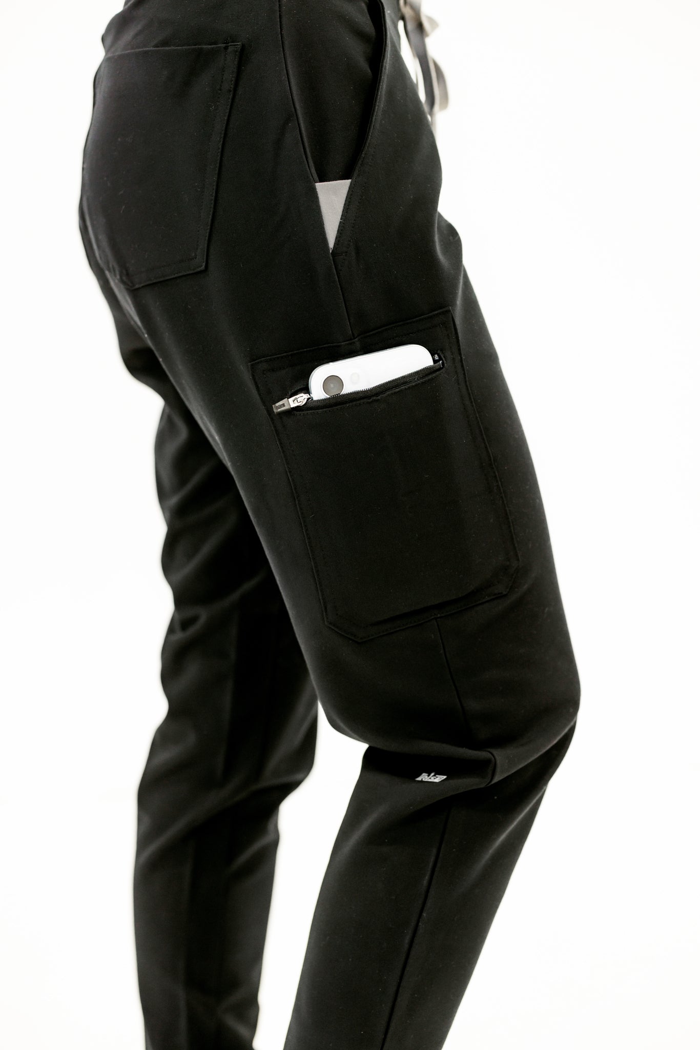 Black jogger scrub pant providing comfort, durability, and a modern fit for busy professionals.