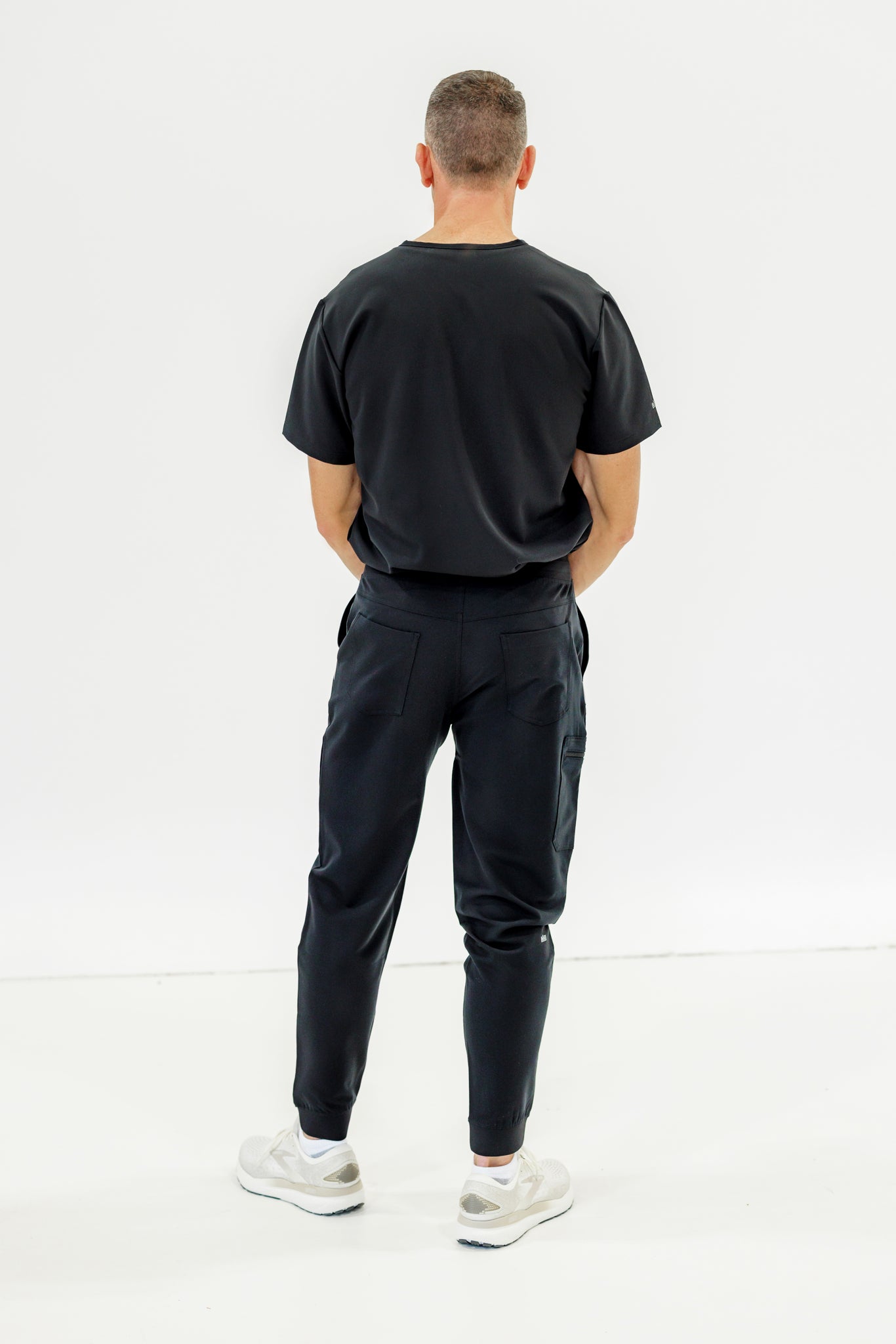 Sleek and flexible black jogger scrub pant providing all-day comfort and a professional look.